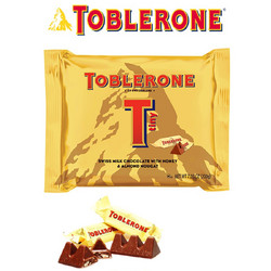 Продуктови Категории Шоколади Toblerone Млечен шоколад с мед и бадем 200 гр. 25 бр.